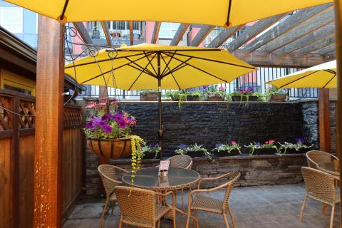 outside patio with water feature in background